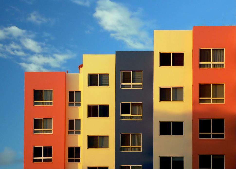 Free Image of Colorful building facades under blue sky 