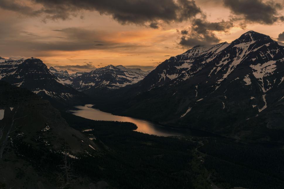 Free Image of Mountainous sunset landscape with glowing lake 