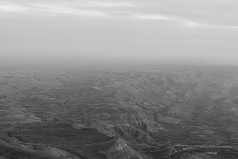 Free Image of Monochrome aerial view of rugged terrain 