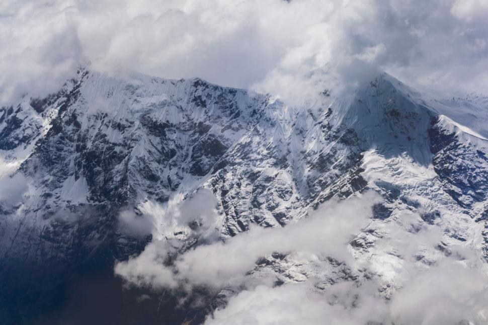 Free Image of Aerial view of snow-capped mountains 