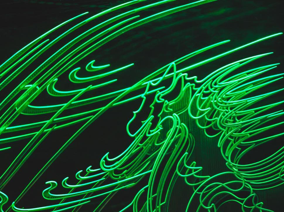 Free Image of Vibrant green neon light abstract patterns 