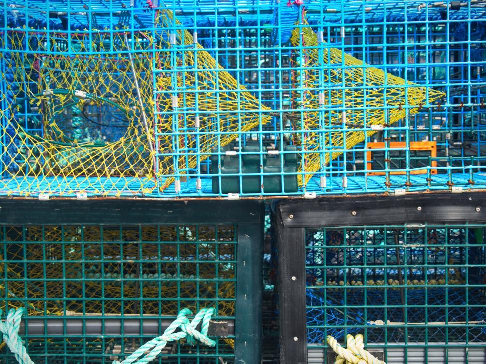Free Image of Stack of colorful fishing lobster traps 
