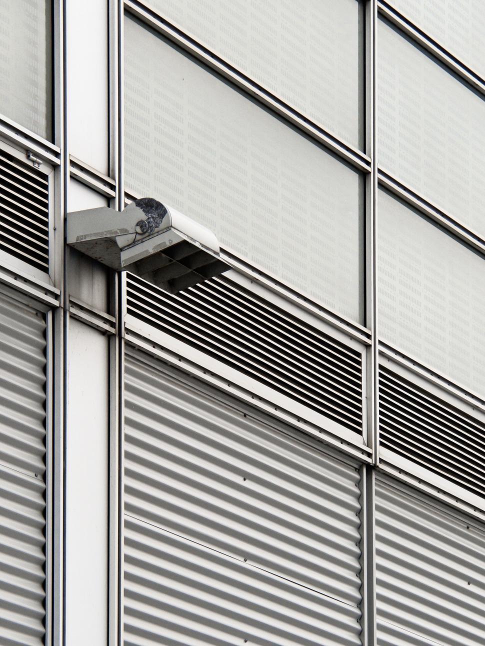 Free Image of Security camera on modern building facade 