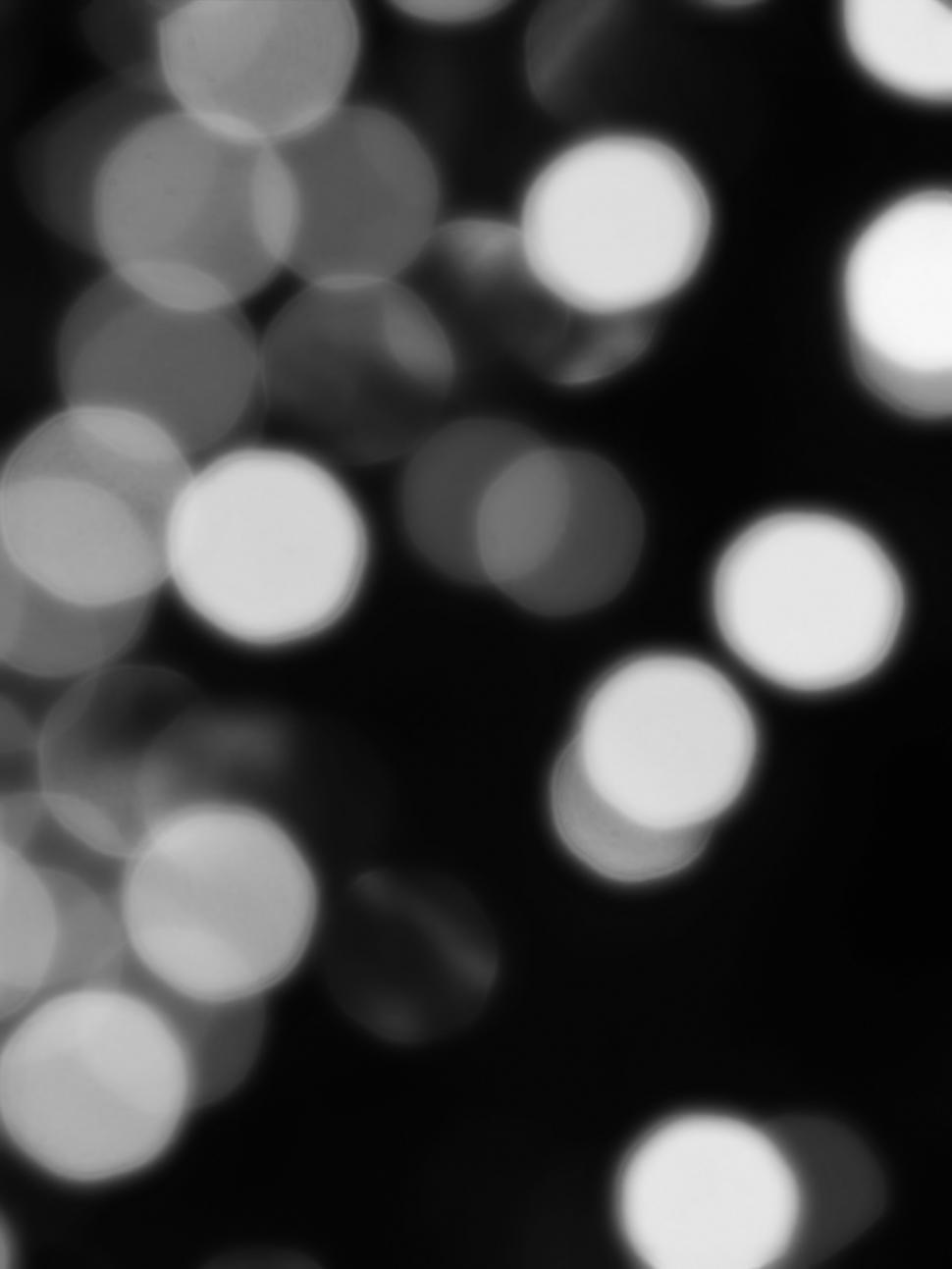 Free Image of Abstract black and white bokeh lights background 