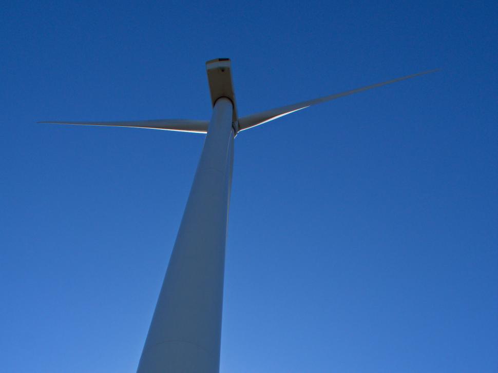Free Image of Wind turbine against deep blue sky 
