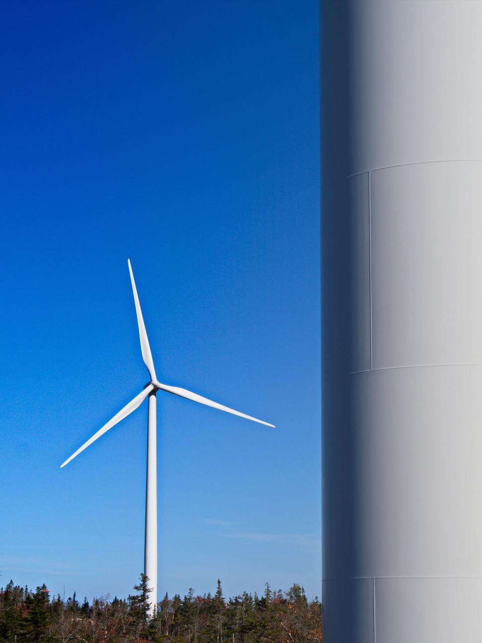 Free Image of Wind turbine against clear blue sky 