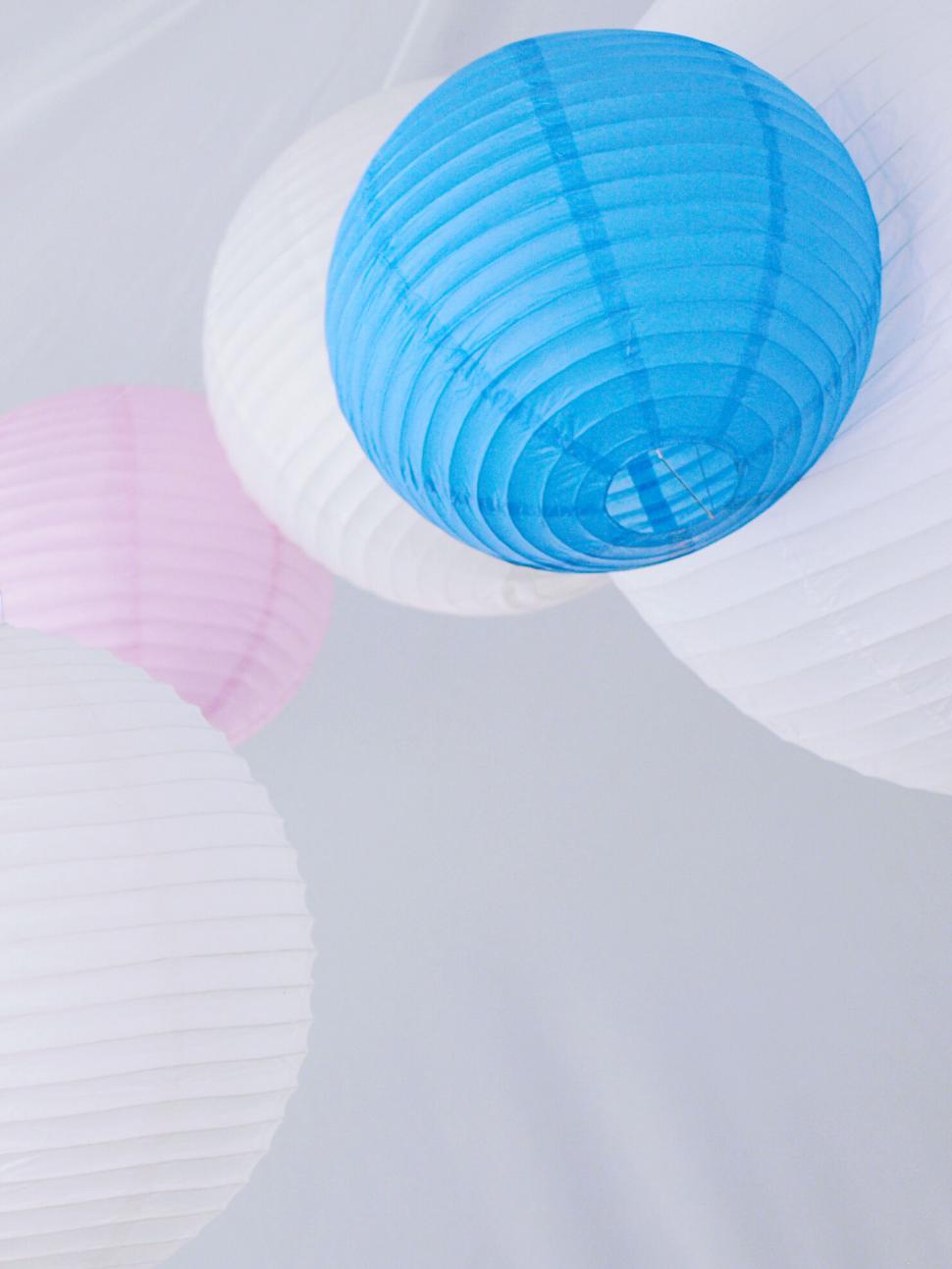 Free Image of Colorful paper lanterns in pastel hues 