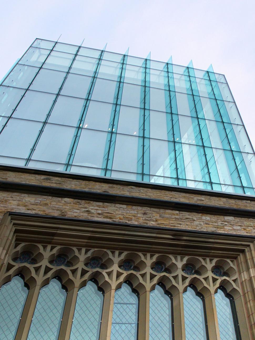 Free Image of Contrast of modern glass and old stone 