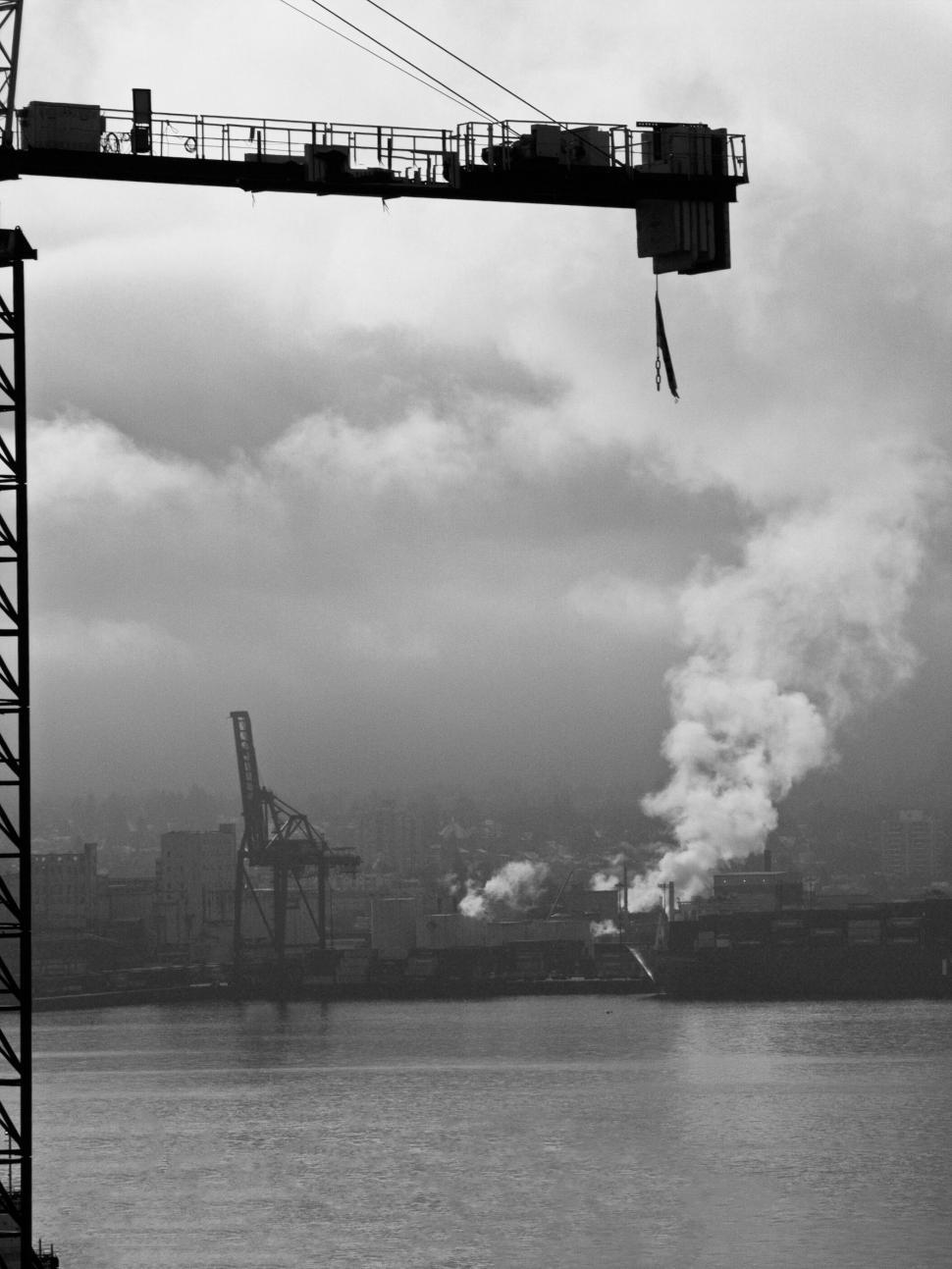 Free Image of Industrial scene with a crane by a port 