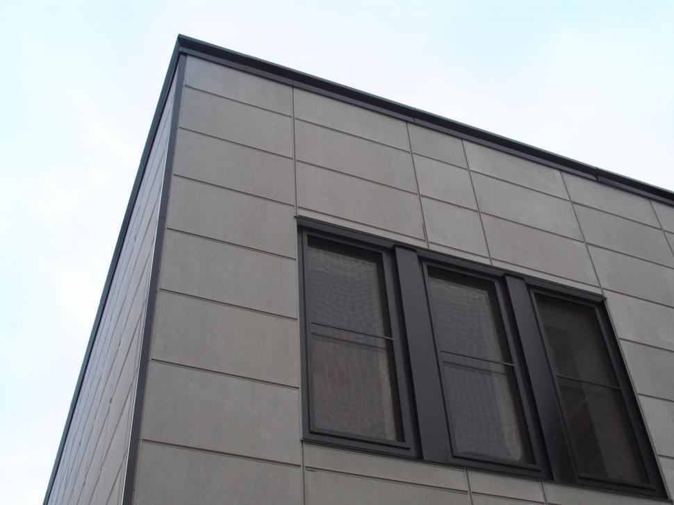 Free Image of Modern building corner with grey tiles 