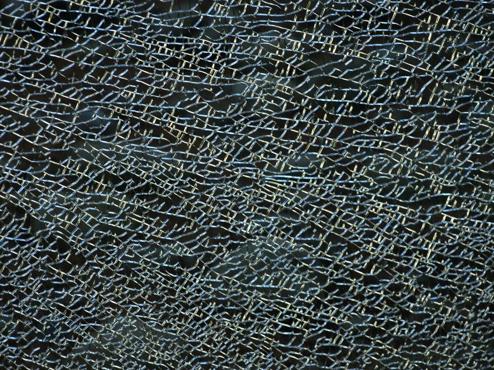 Free Image of Close-up of intricate shattered glass texture 