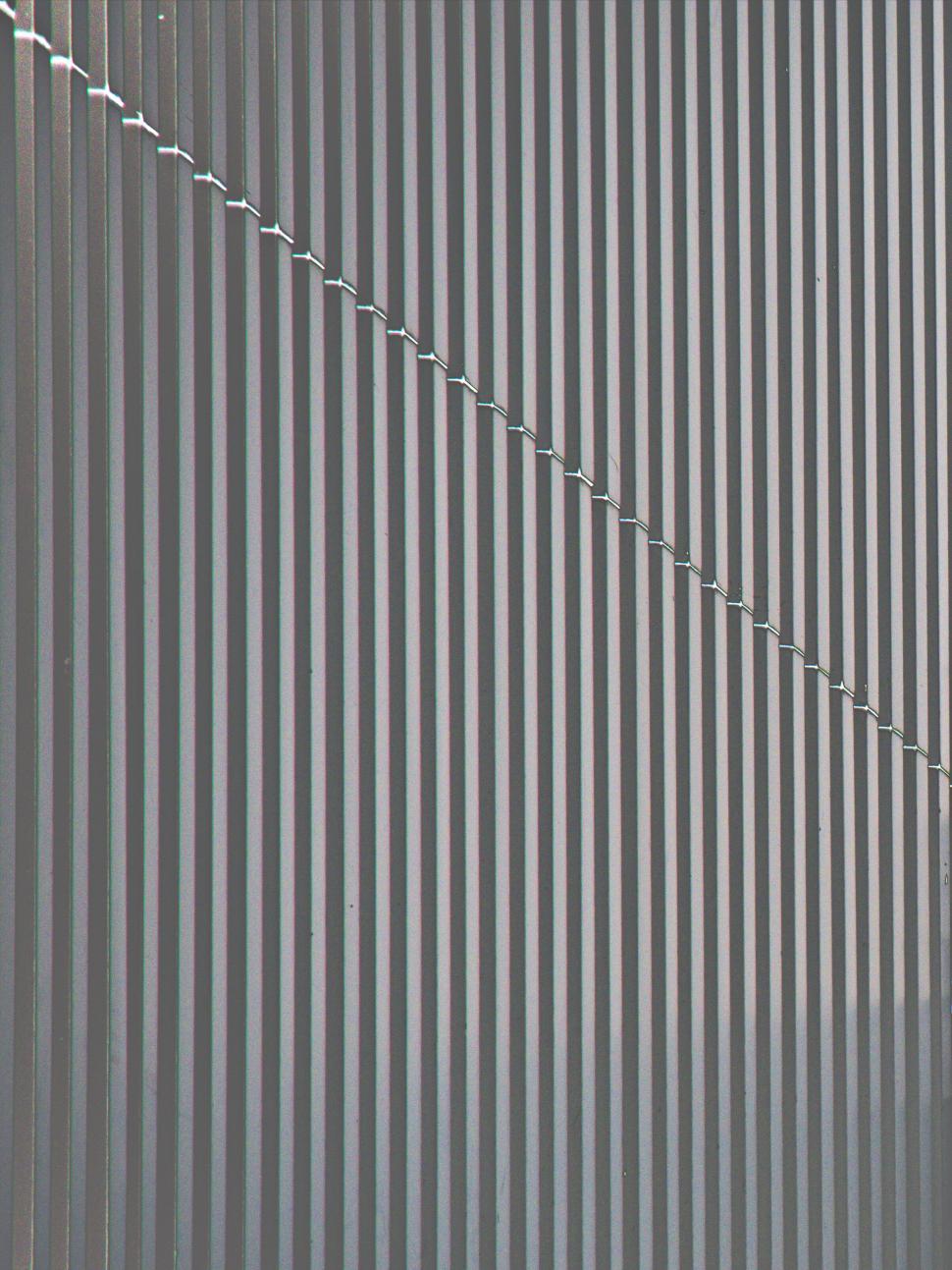 Free Image of Abstract pattern of parallel lines and shadow 