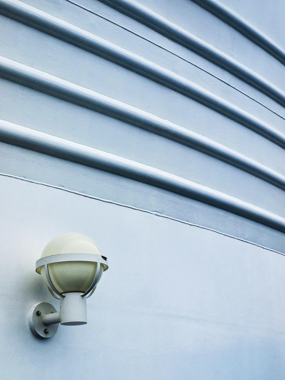 Free Image of Modern wall with security camera attached 