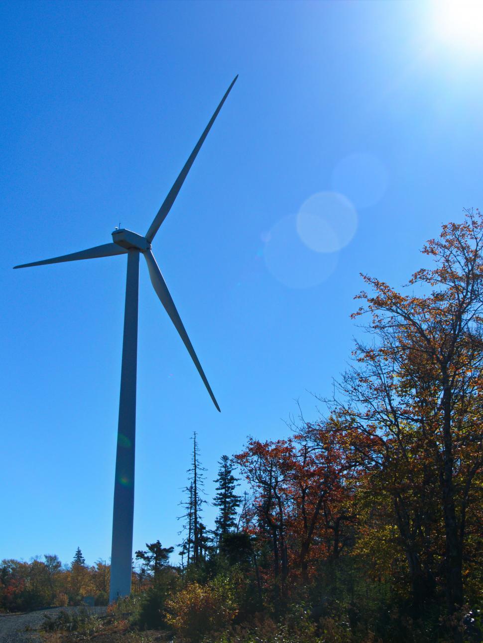 Free Image of Majestic Wind Turbine Against Clear Blue Sky 