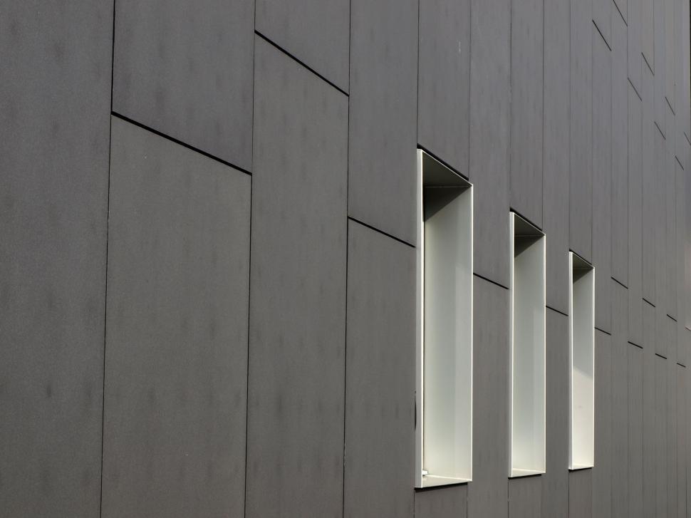 Free Image of Modern building facade with geometric windows 