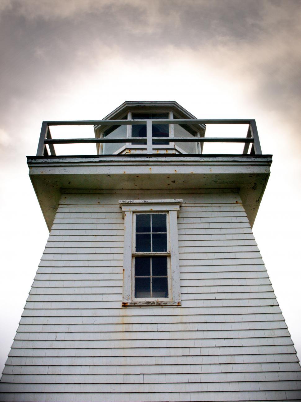 Free Image of Historic Lighthouse Looking Up from the Base 