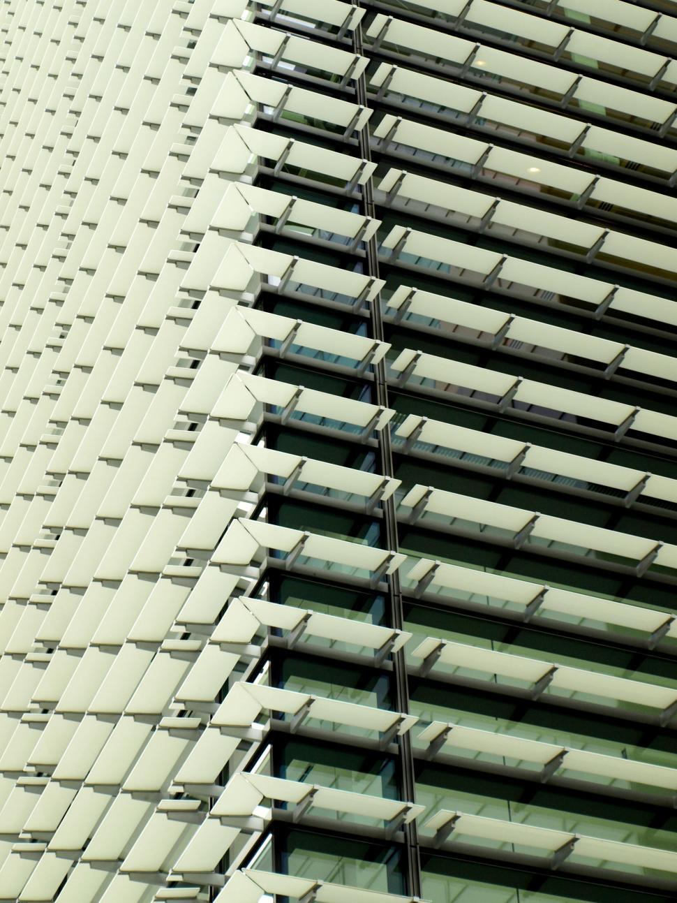Free Image of Modern building with unique window shades 