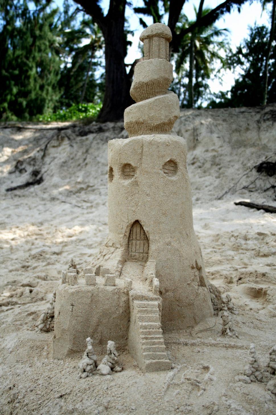 Free Image of Intricate sand castle on a beach 