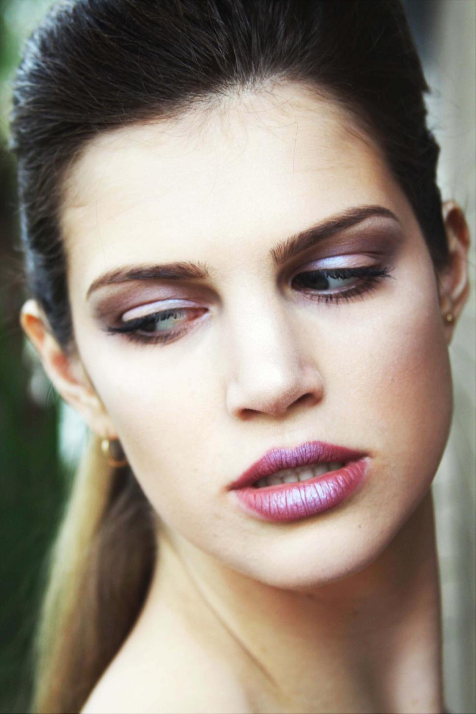 Free Image of Close-up of woman s face with makeup 