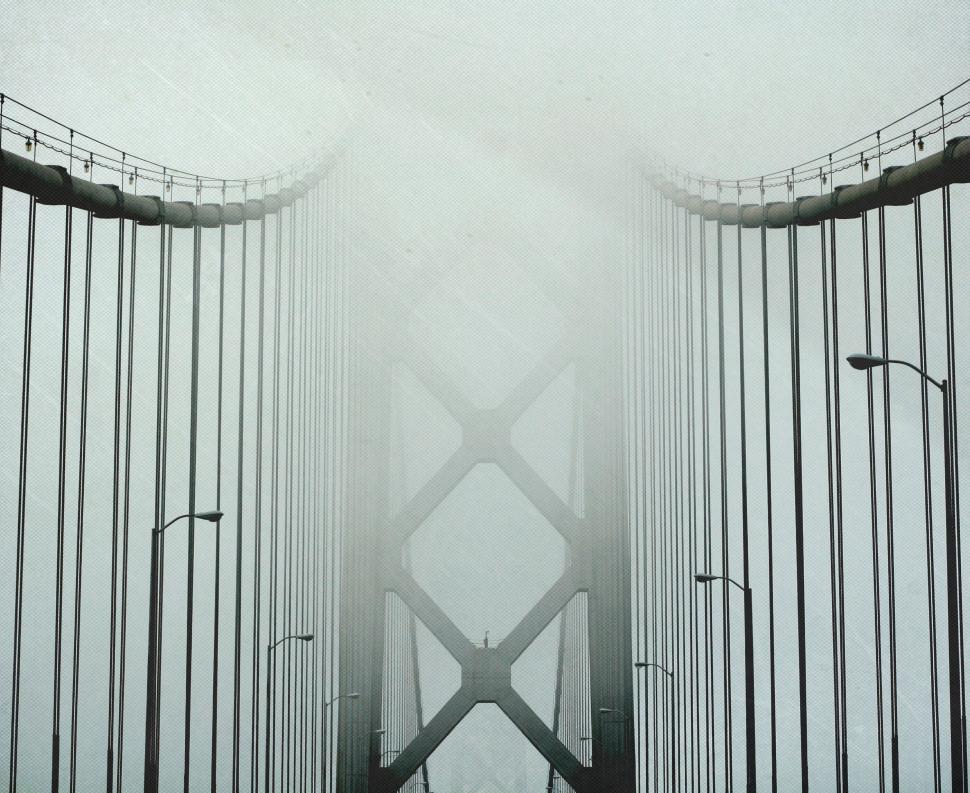 Free Image of Foggy symmetrical bridge details visible 