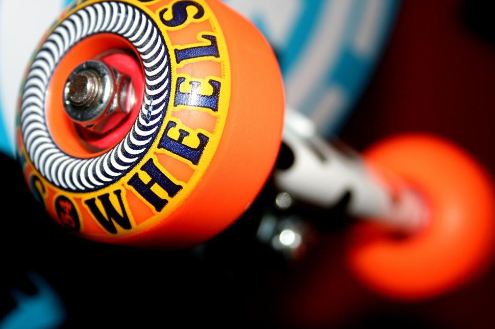 Free Image of Skateboard wheel with bright graphics 