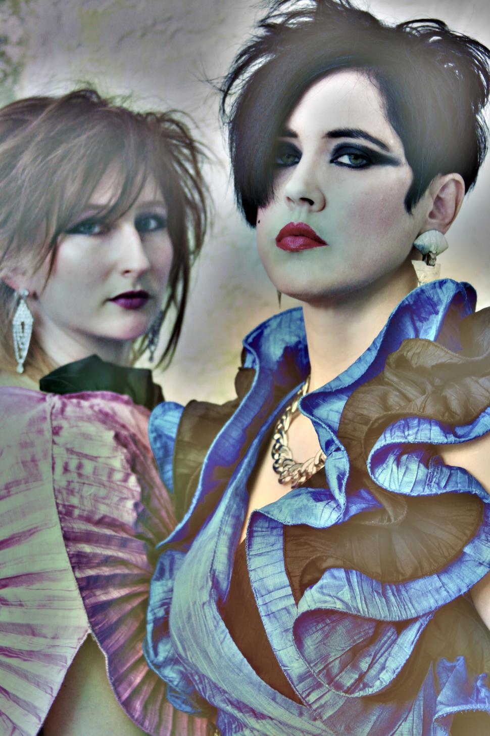 Free Image of Stylized photo of two women in avant-garde attire 
