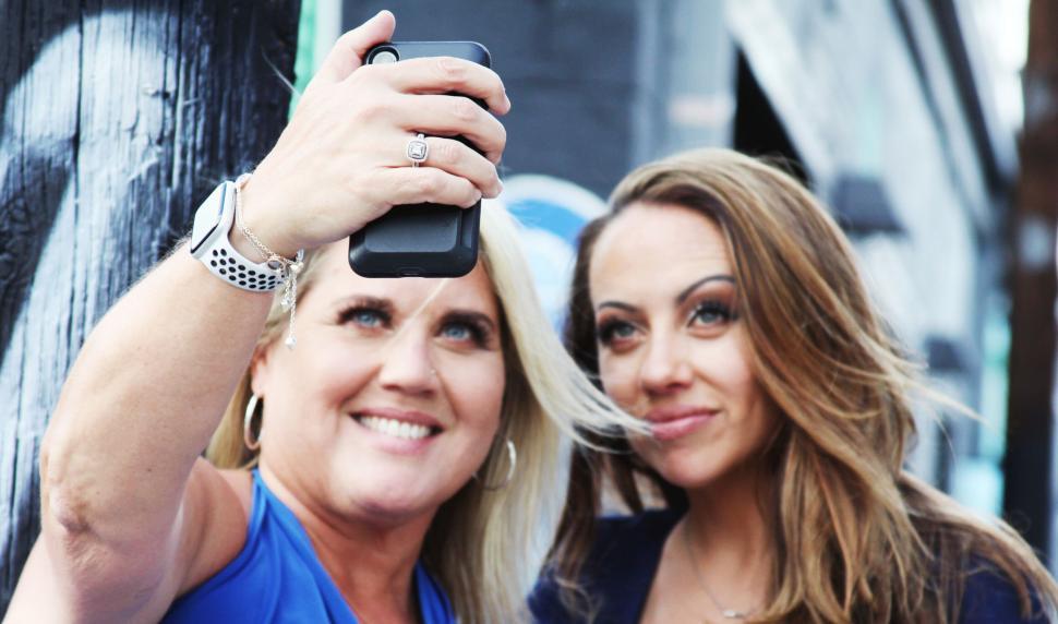 Free Image of Two women taking a selfie together 