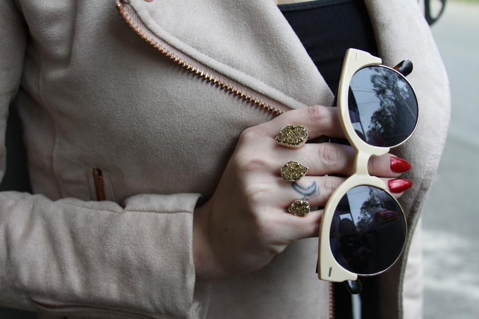 Free Image of Fashionable sunglasses held in hand 