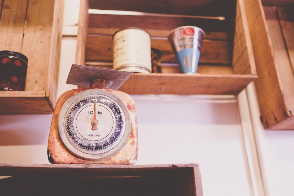 Free Image of Vintage kitchen scale on rustic wooden shelf 