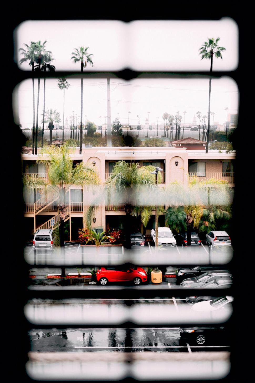 Free Image of View Through Blinds on a Rainy Day 