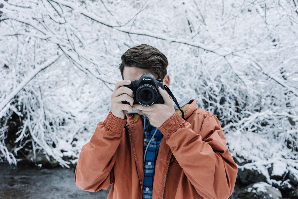 Free Image of Photographer facing winter landscape 