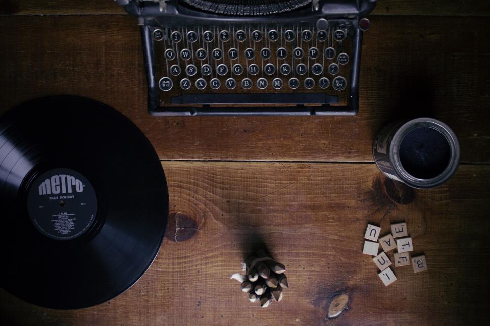 Free Image of Vintage typewriter and vinyl record setup 