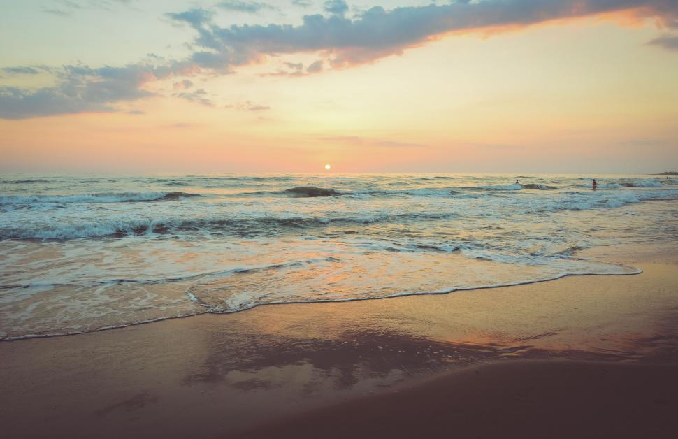 Free Image of Golden Beach Sunset with Gentle Waves 