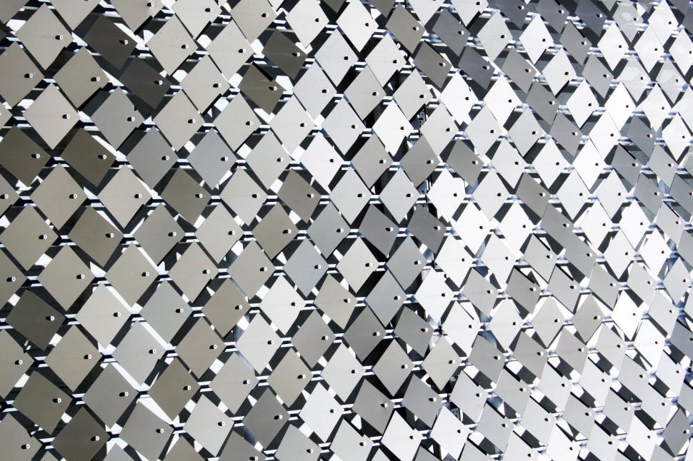 Free Image of Abstract pattern of metallic building facade 