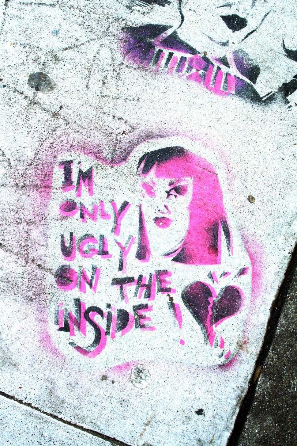 Free Image of Urban graffiti art with censored message 
