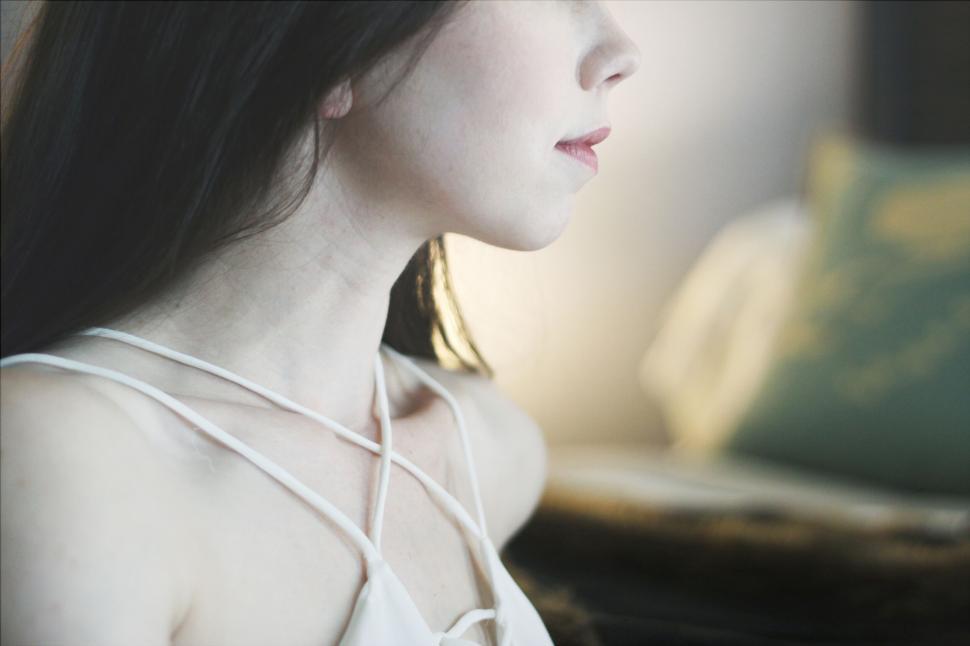 Free Image of Woman s neck and shoulder in soft light 