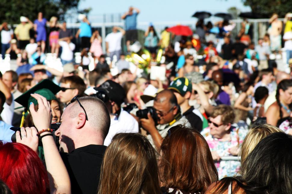 Free Image of Crowded outdoor event with diverse audience 