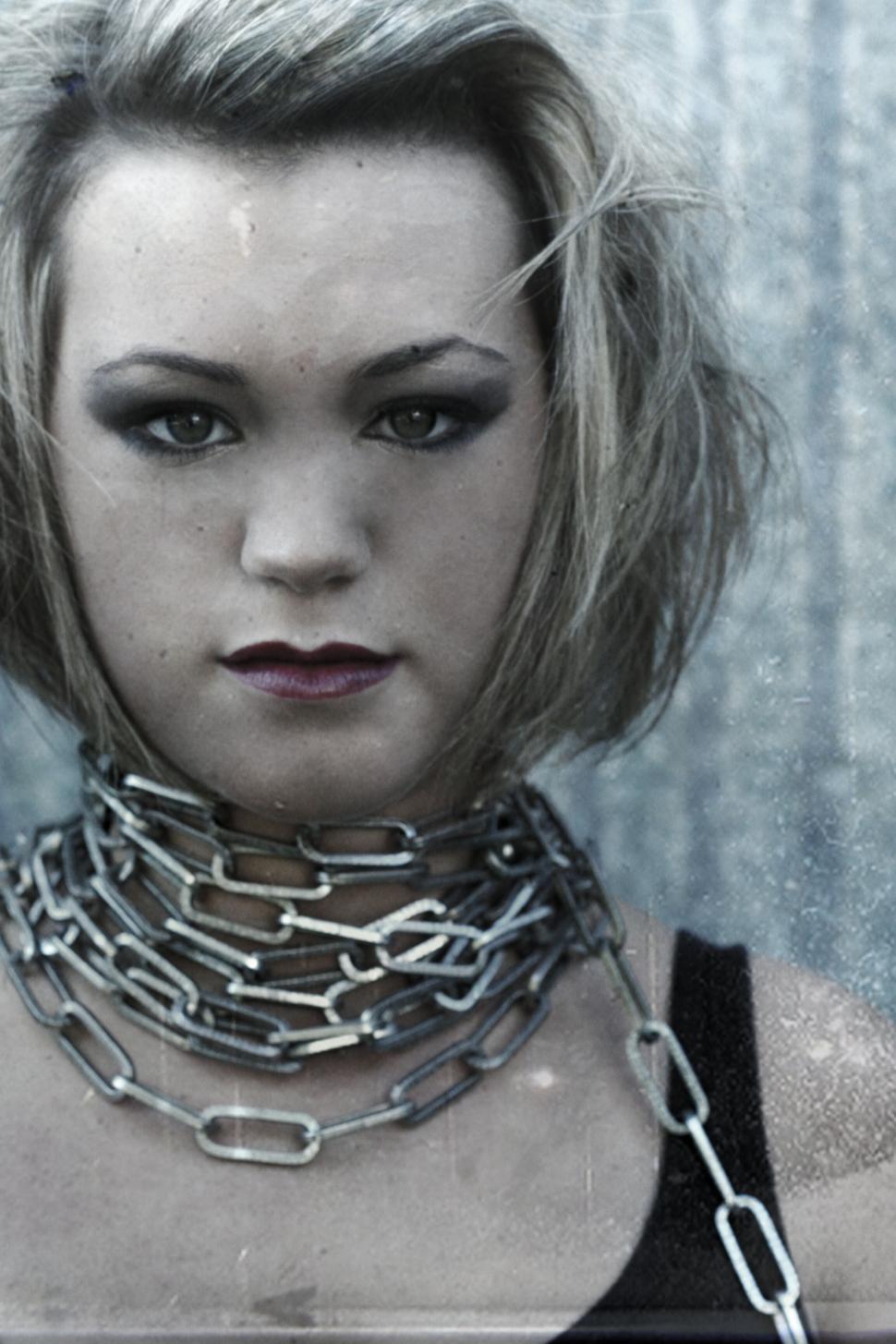 Free Image of Intense portrait with chain accessory 