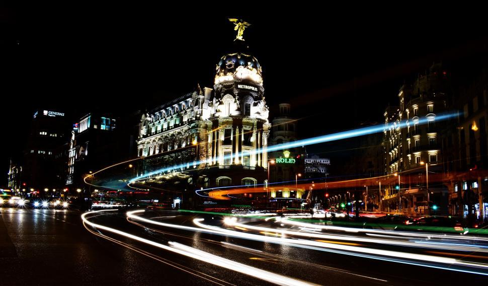Free Image of Iconic building illuminated by night traffic 