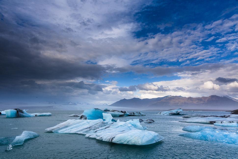 Free Image of Dramatic icy landscape under stormy skies 