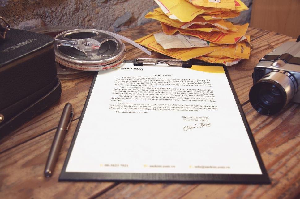 Free Image of Vintage Styled Writing Desk with Camera and Letter 