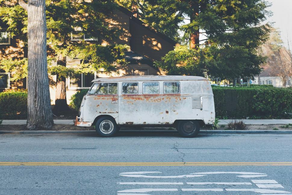 Free Image of Vintage white van parked on a street 
