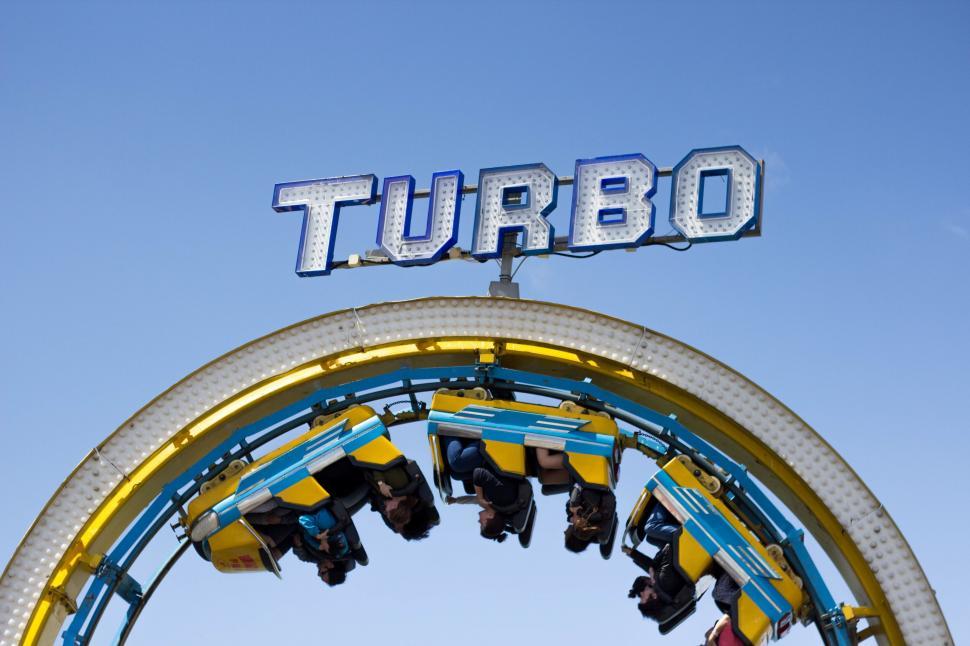 Free Image of Roller coaster ride against blue sky 