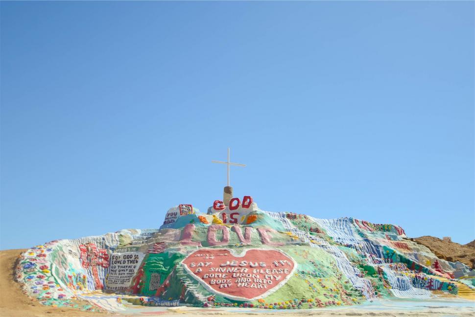 Free Image of Colorful Salvation Mountain in the desert 