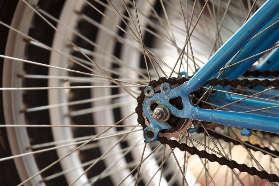 Free Image of Close-up blue bicycle sprocket and wheel 