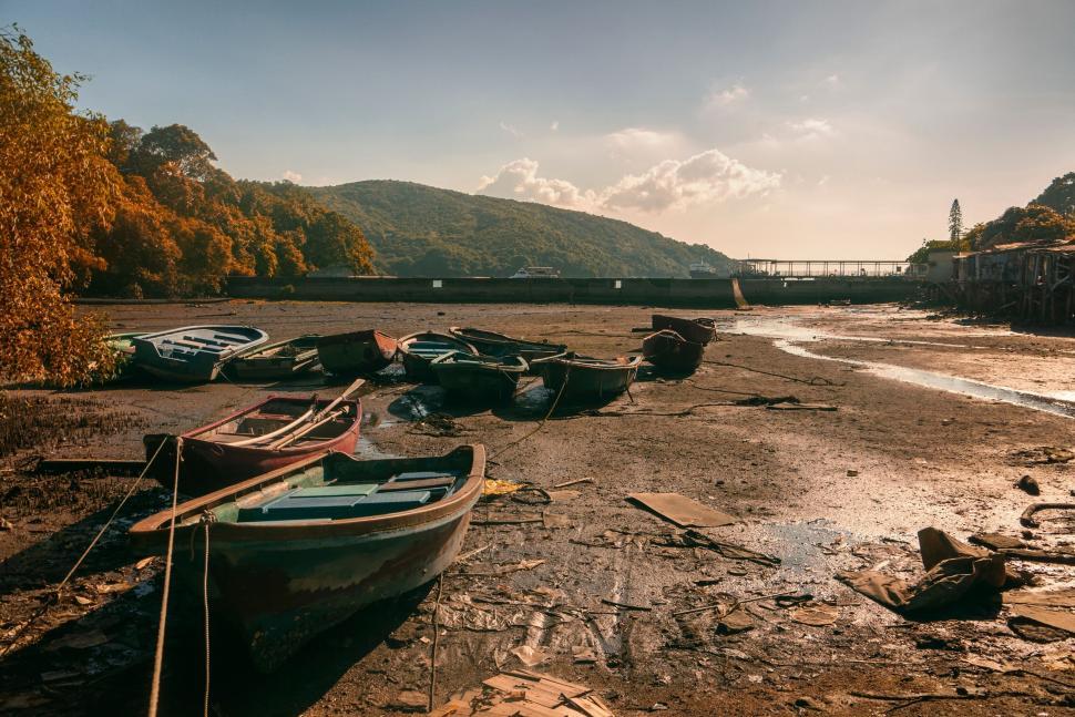 Free Image of Abandoned boats on dried riverbed 