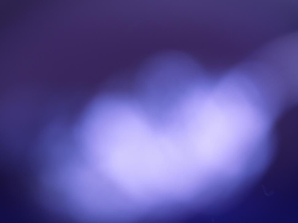 Free Image of Abstract blue and purple light bokeh 