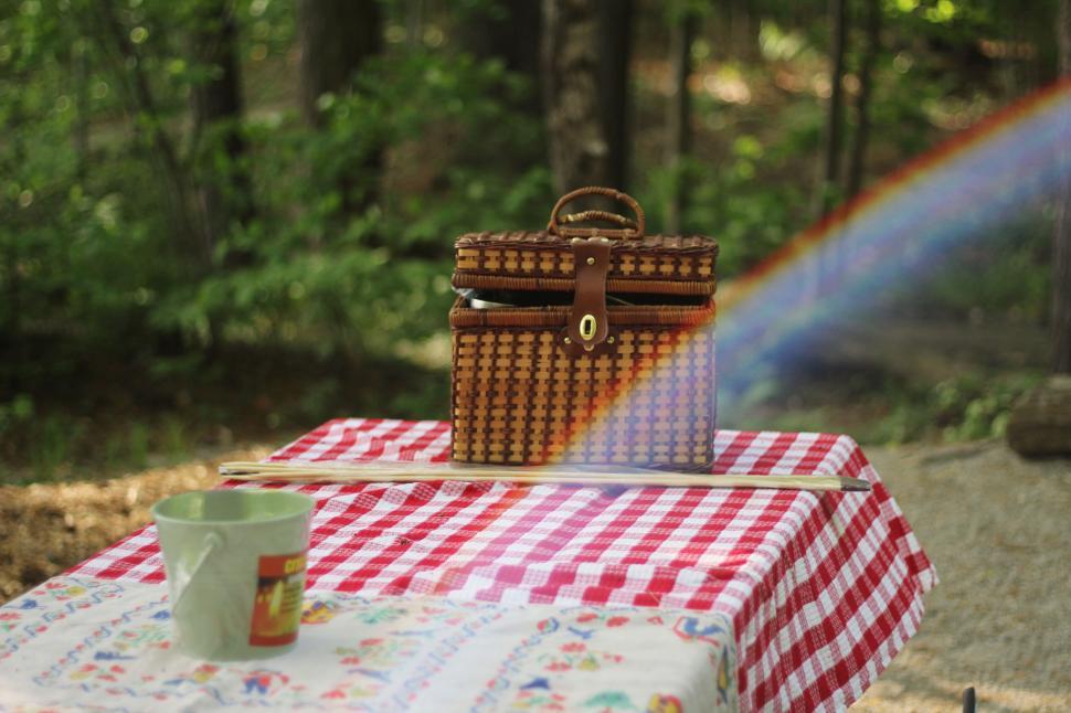 Free Image of Picnic basket with rainbow on a checkered tablecloth 