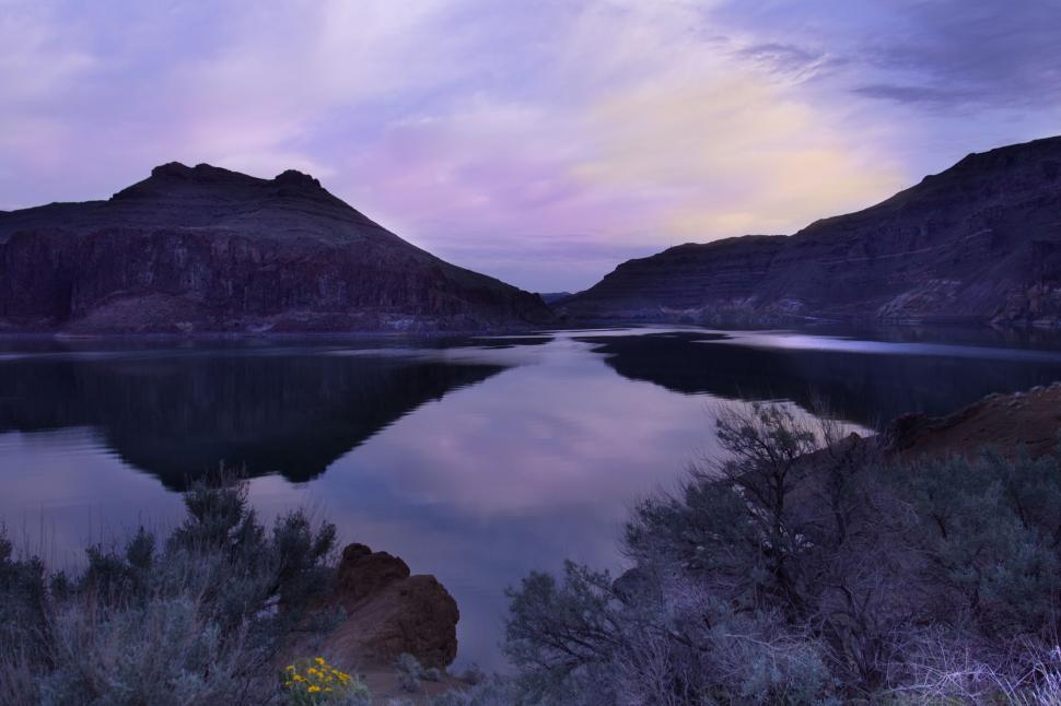 Free Image of Serenity at dusk on a calm mountain lake 