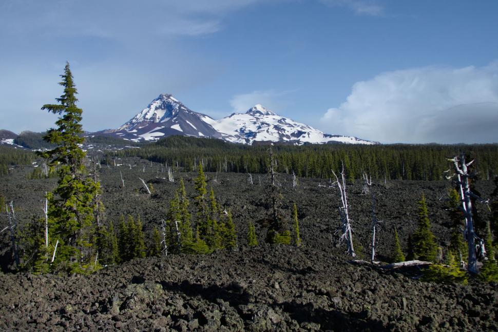 Free Image of Volcanic landscape with snow-covered mountains 